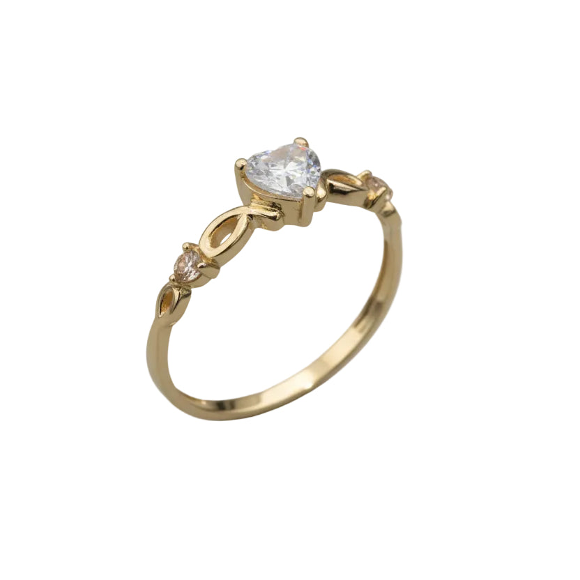 Anillo corazon cruzado en Oro