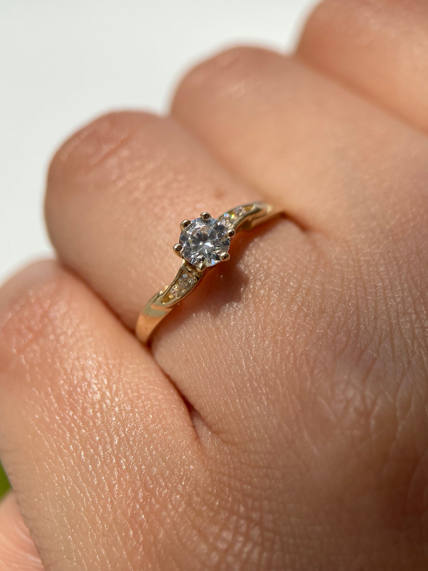 Ring in 14k yellow gold with white zirconias Cod. MAN246