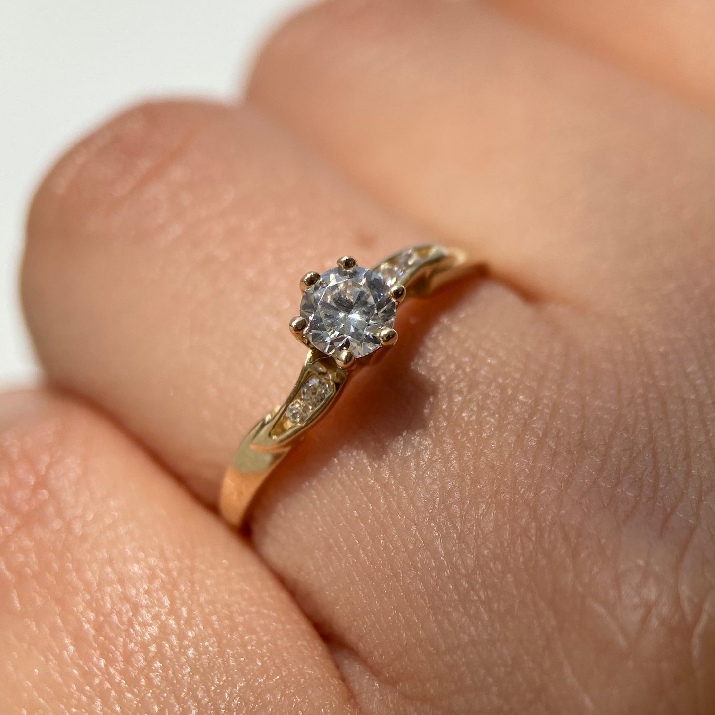 Ring in 14k yellow gold with white zirconias Cod. MAN246