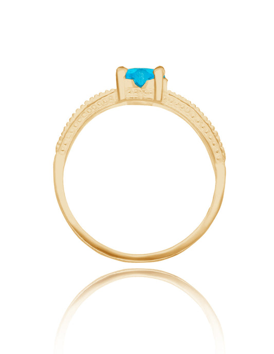 Anillo Fanny en oro amarillo 14k con circonia azul cielo