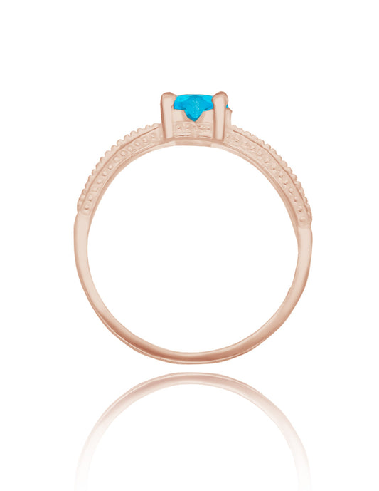 Anillo Fanny en oro rosa 10k con circonia azul cielo