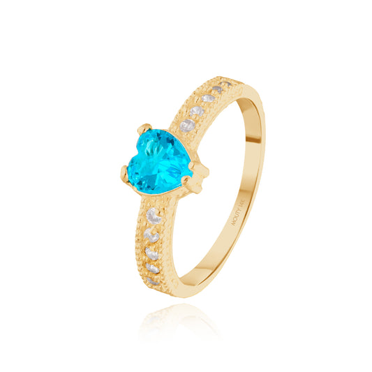 Anillo Fanny en oro amarillo 14k con circonia azul cielo