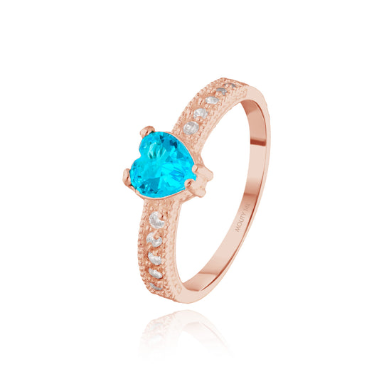 Anillo Fanny en oro rosa 14k con circonia azul cielo