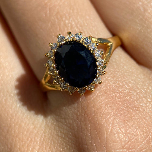 Anillo Renata de Plata en Baño de Oro Amarillo con Circonia Azul (Lady Di)